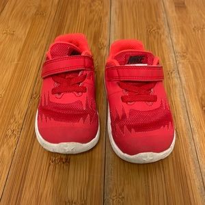Gently used red Nike sneakers